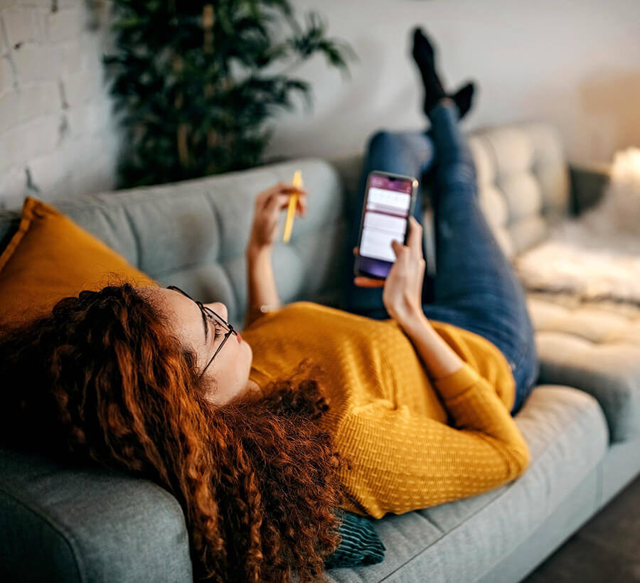 Woman signing up for online banking with Red Canoe