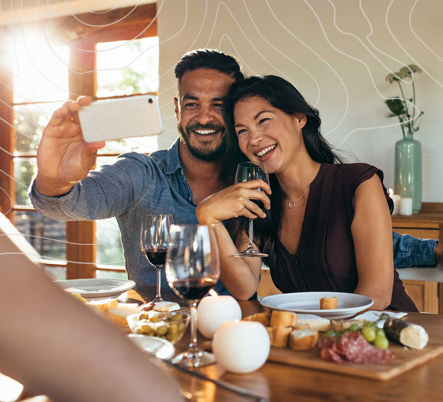 Couple eating dinner in their new home financed with a Home Loan from Red Canoe