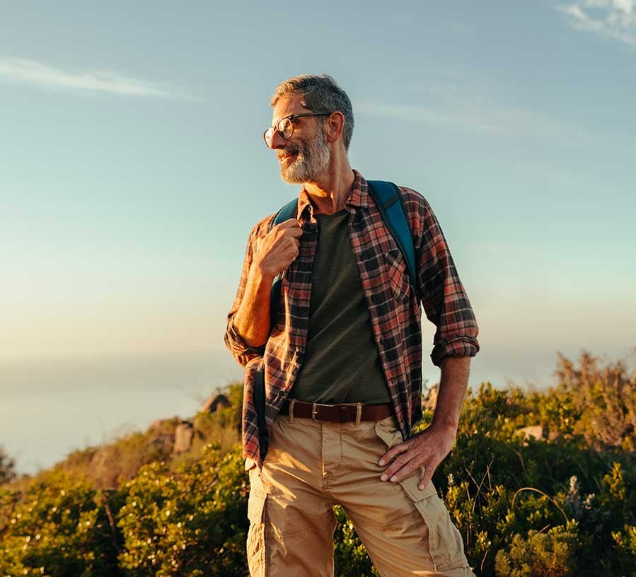 Man with a Red Canoe Money Market account hiking