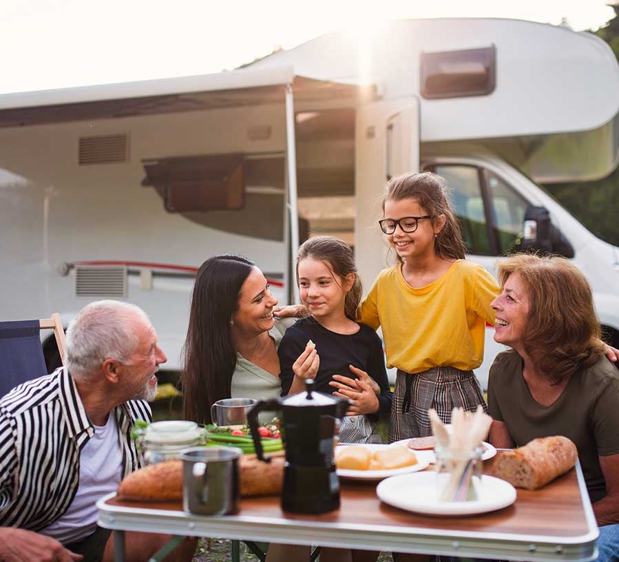 Family enjoying time in RV financed by Red Canoe