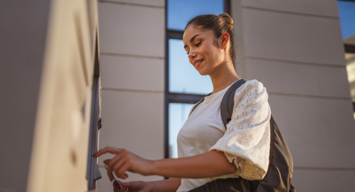 woman using co-op atm